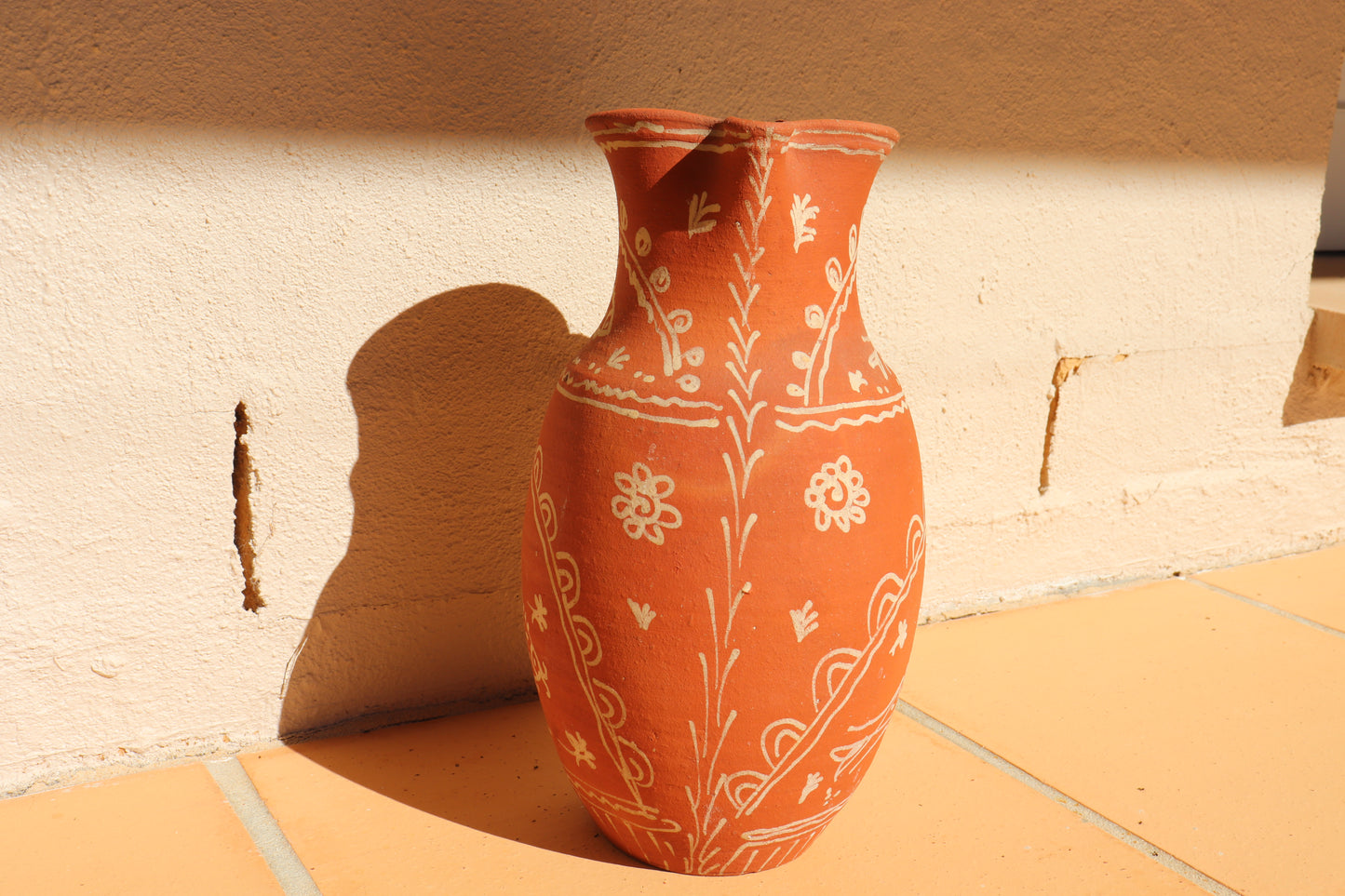 HAND PAINTED TERRACOTTA JUG