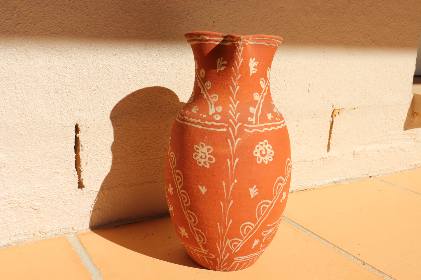 HAND PAINTED TERRACOTTA JUG