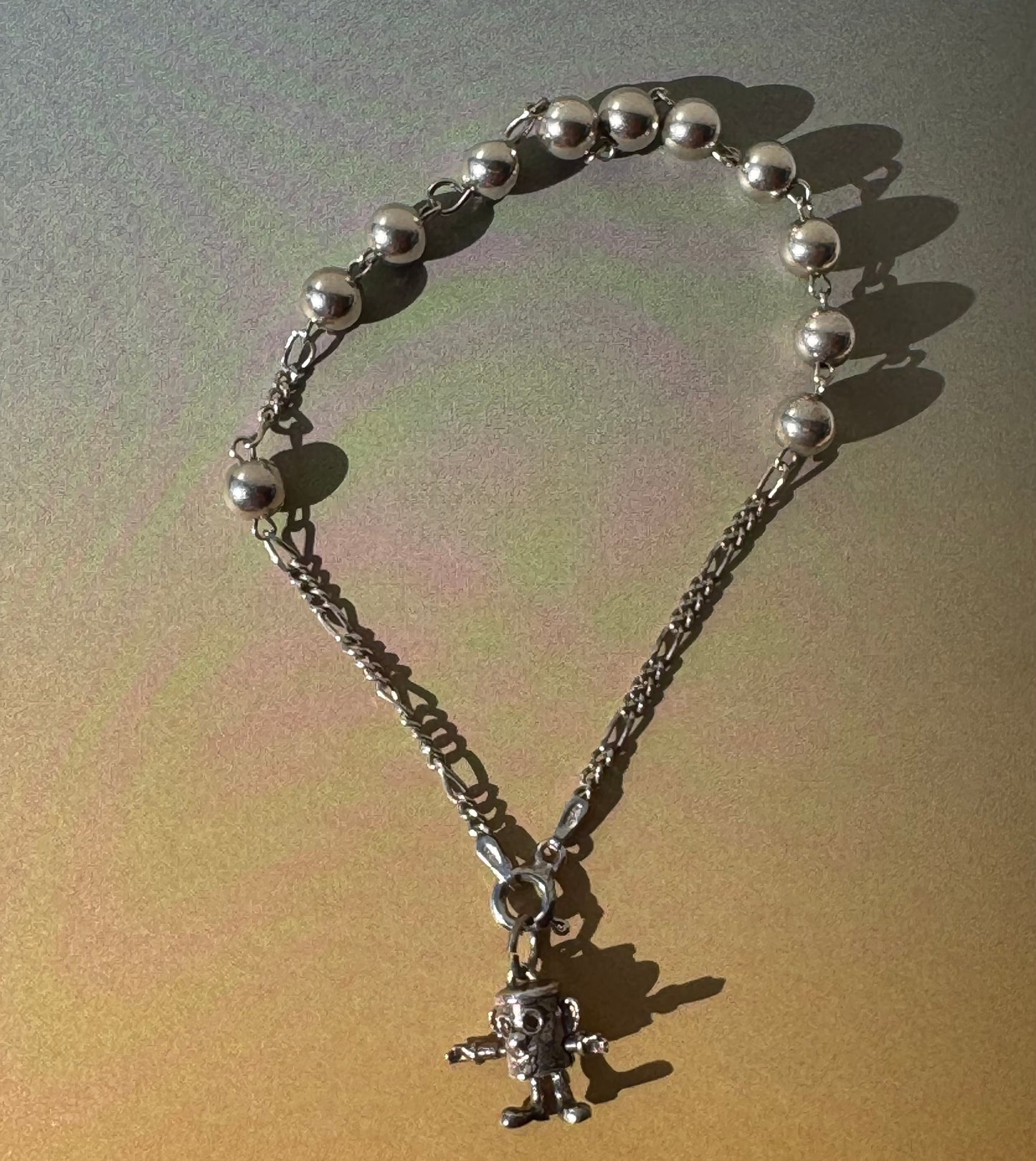 STERLING SILVER BRACELET WITH PENDANT