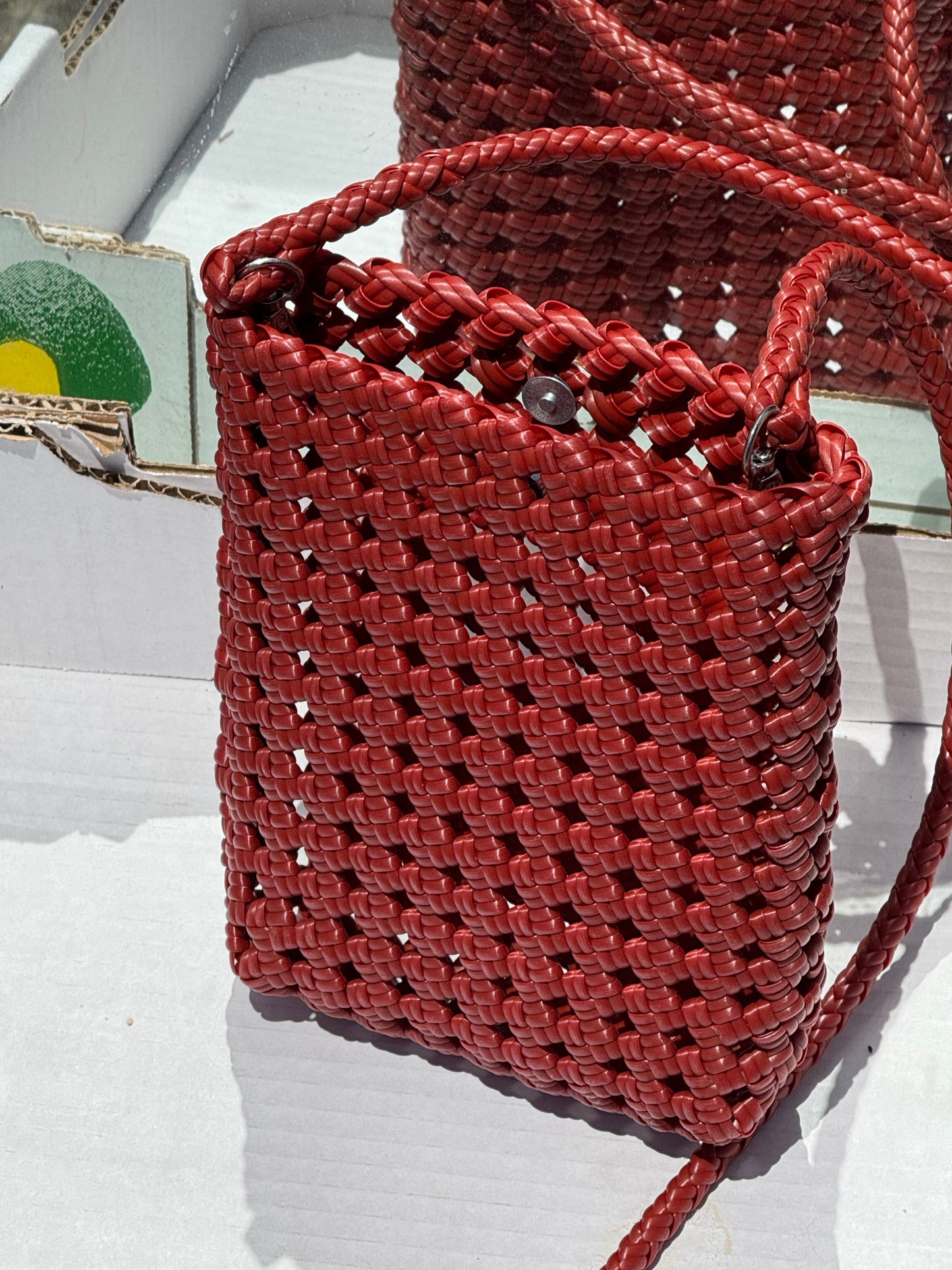 RECYCLED PLASTIC WOVEN CROSS OVER BAG RED