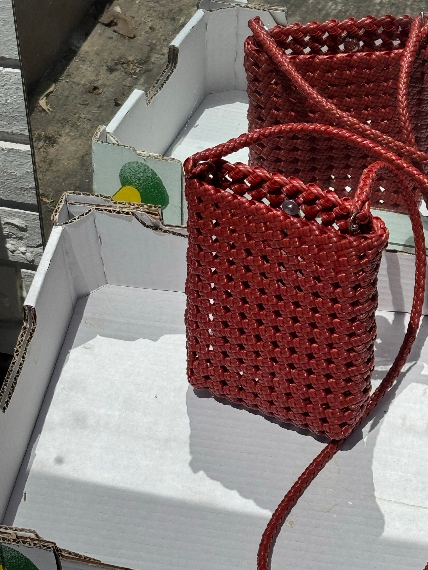 RECYCLED PLASTIC WOVEN CROSS OVER BAG RED