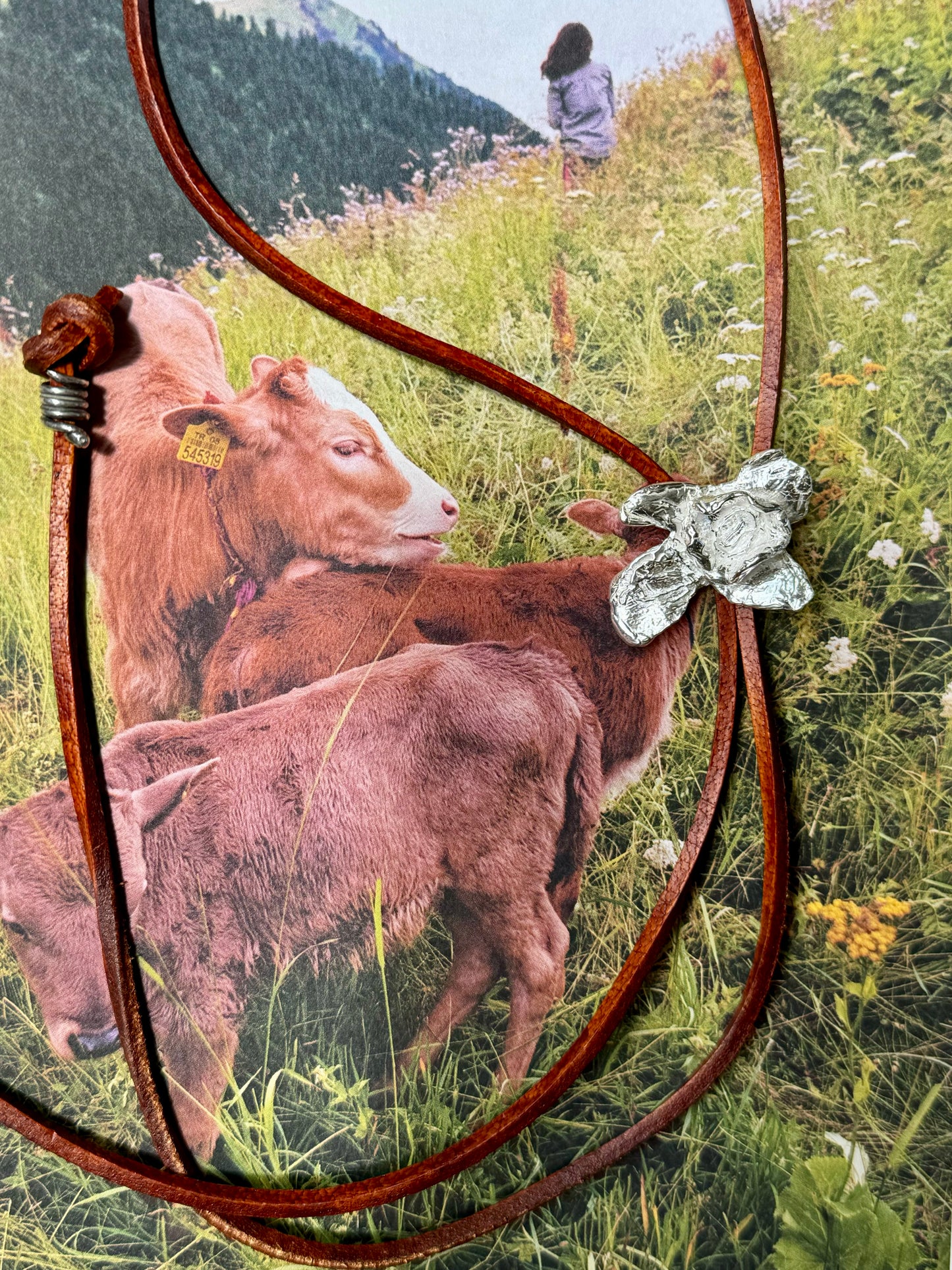 STERLING SILVER FLOWER LEATHER BOLO