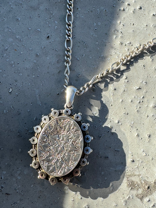 ANTIQUE STERLING SILVER LOCKET FLORAL PENDANT